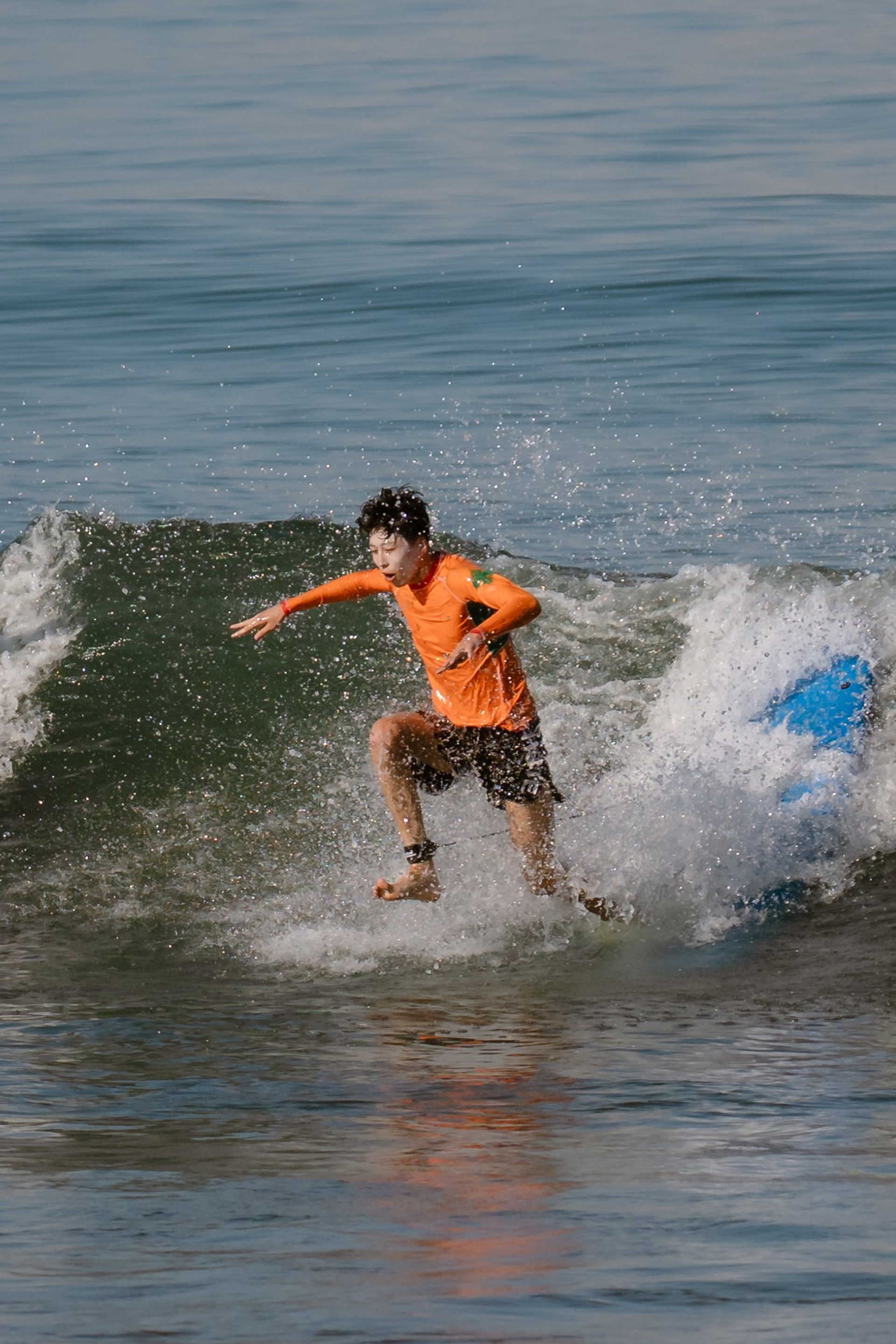 Al Leone athletes having fun surfing in the Pacific Ocean. Сергей Зворыгин