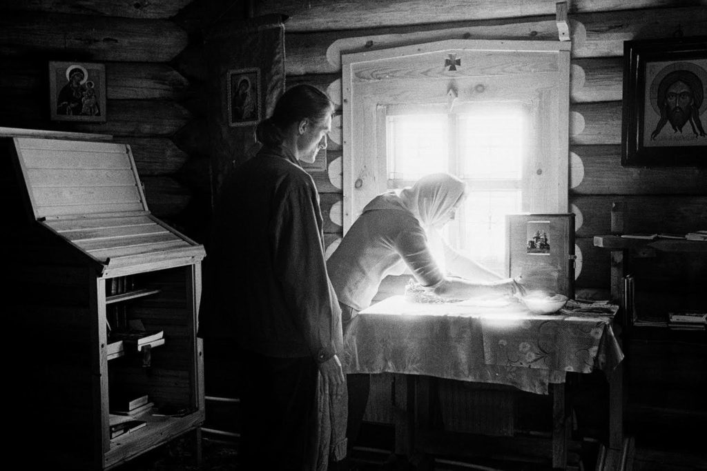 Viktor and Elena, singers in the church, clean up after the service. Summer 2016.