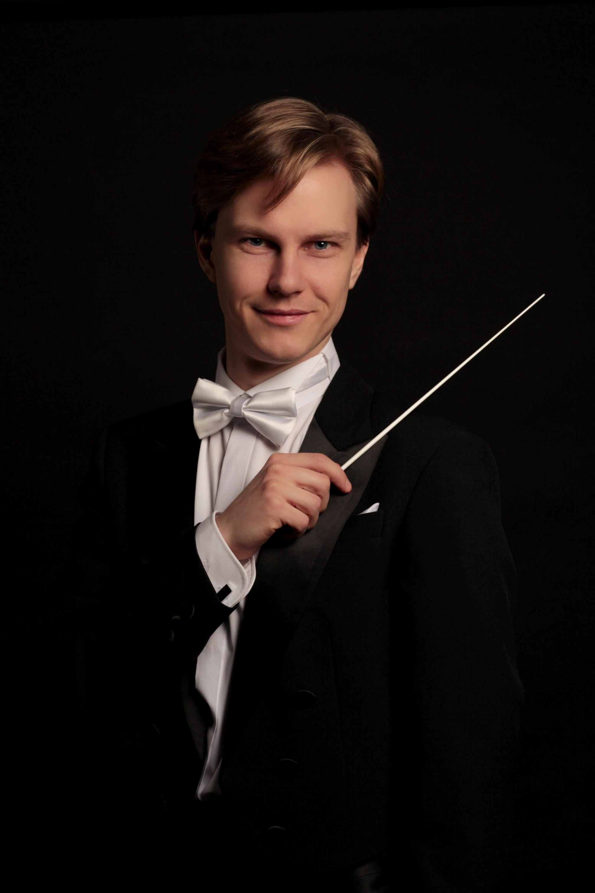 Дирижер Андрей Колясников