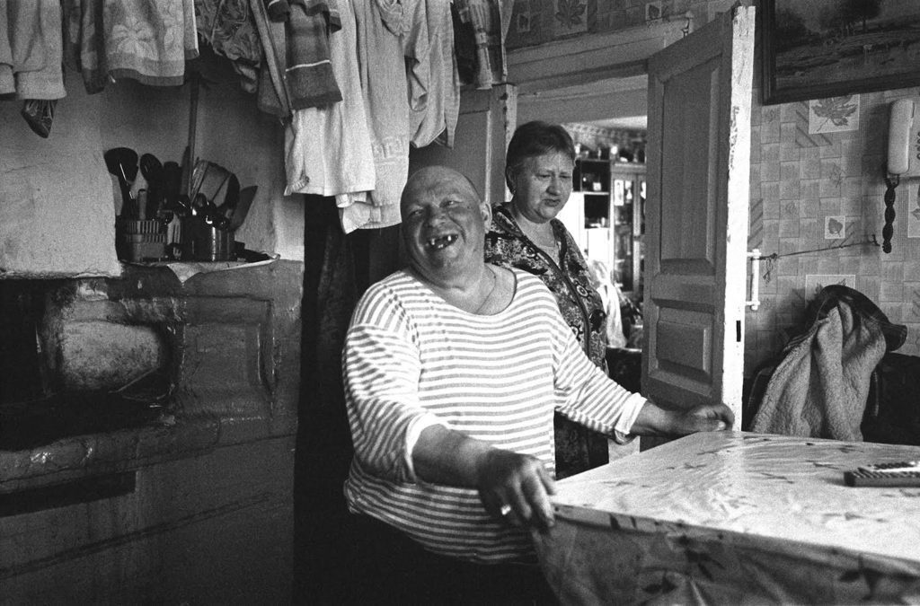 Village resident Uncle Pasha shares an anecdote. Spring 2013.