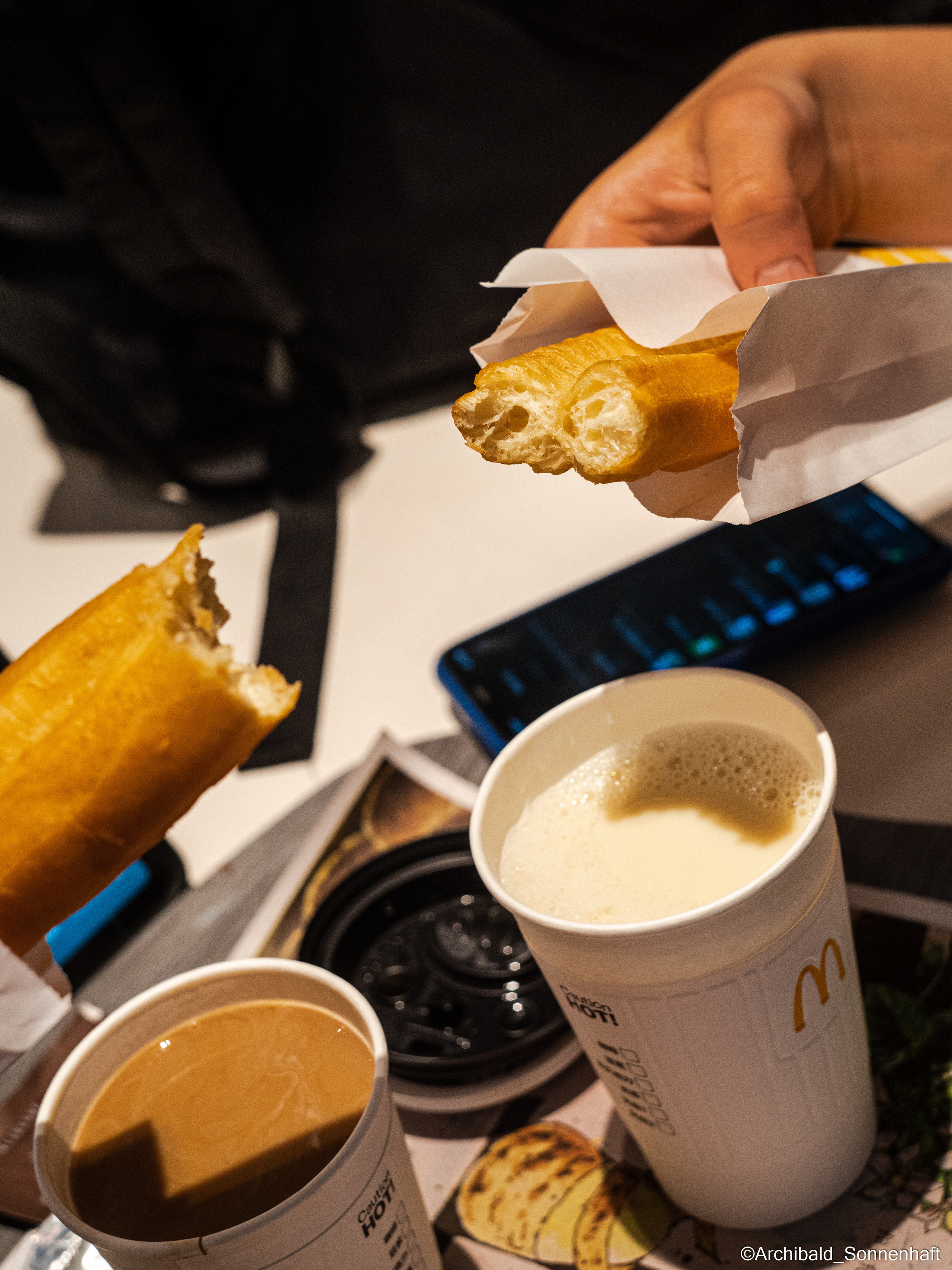 Campaign to the radio station. Photographer in Guangzhou, China. Archibald Sonnenhaft