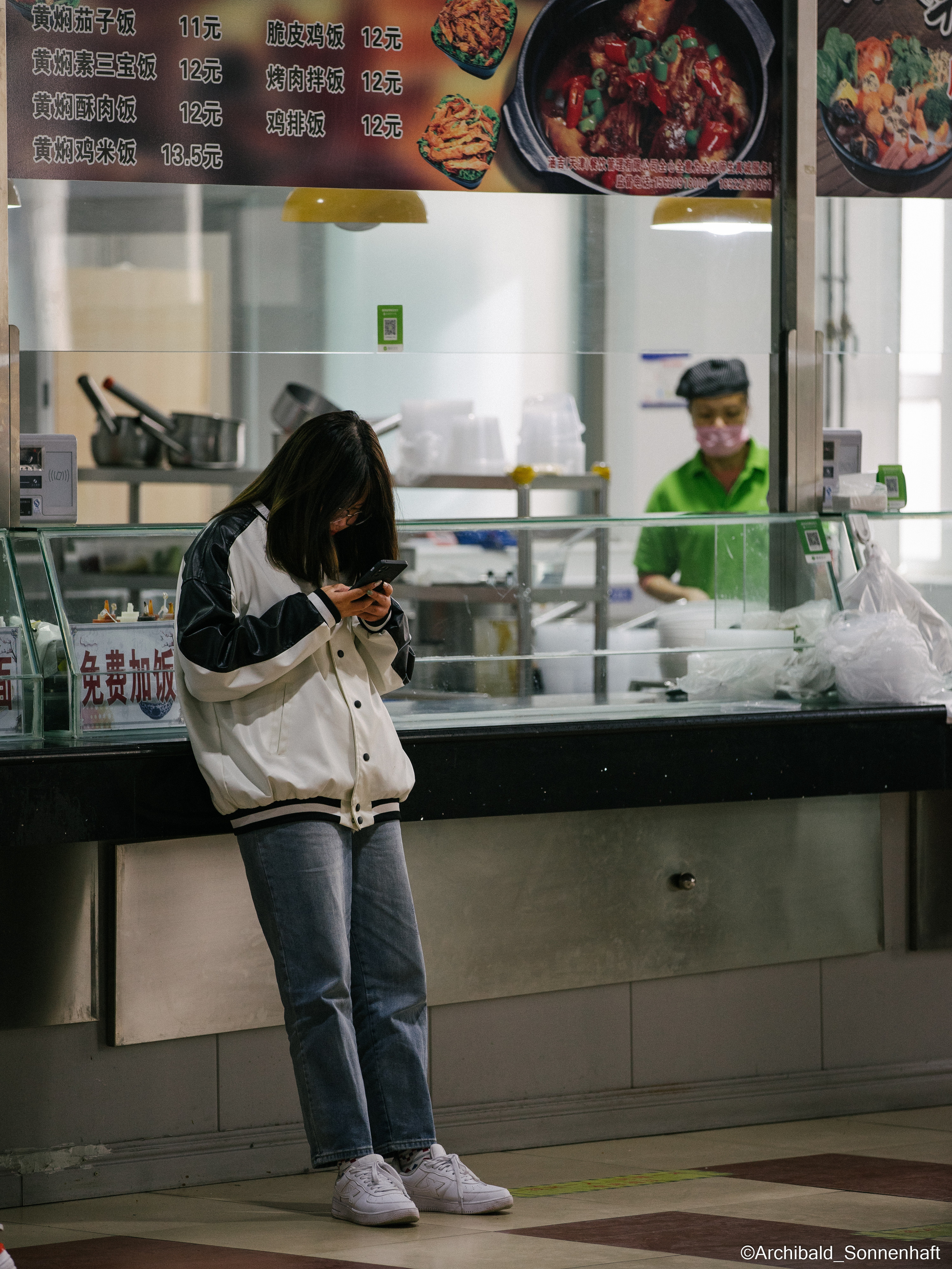 Campaign to the radio station. Photographer in Guangzhou, China. Archibald Sonnenhaft