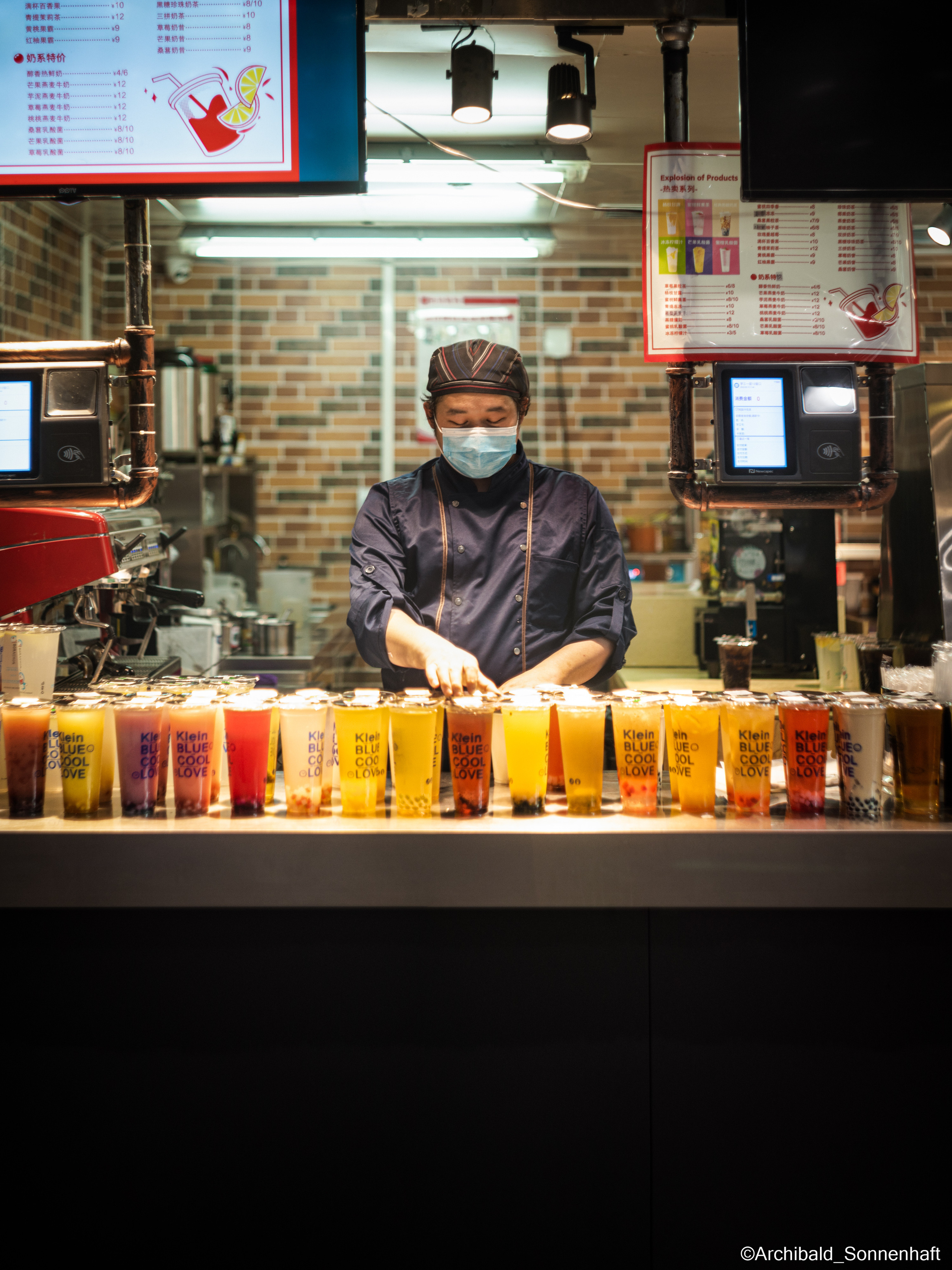 Campaign to the radio station. Photographer in Guangzhou, China. Archibald Sonnenhaft