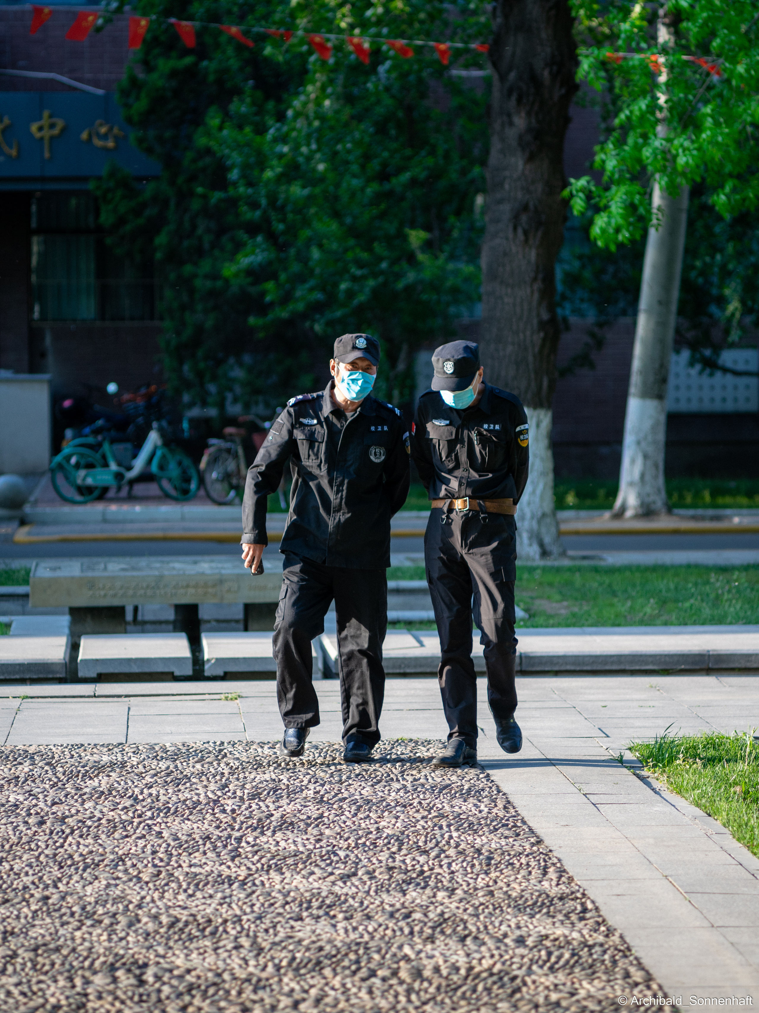 Walking in TJU on the first of May. Photographer in Guangzhou, China. Archibald Sonnenhaft