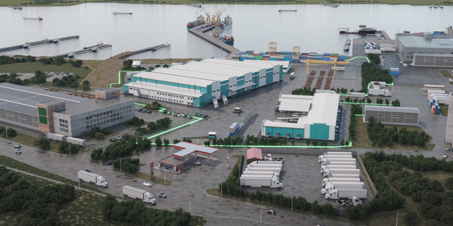 Вид с высоты на промышленный комплекс с цехами и открытыми площадками.