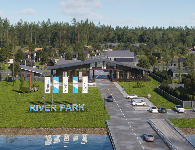Вид с высоты на въезд в загородный комплекс River Park среди леса.