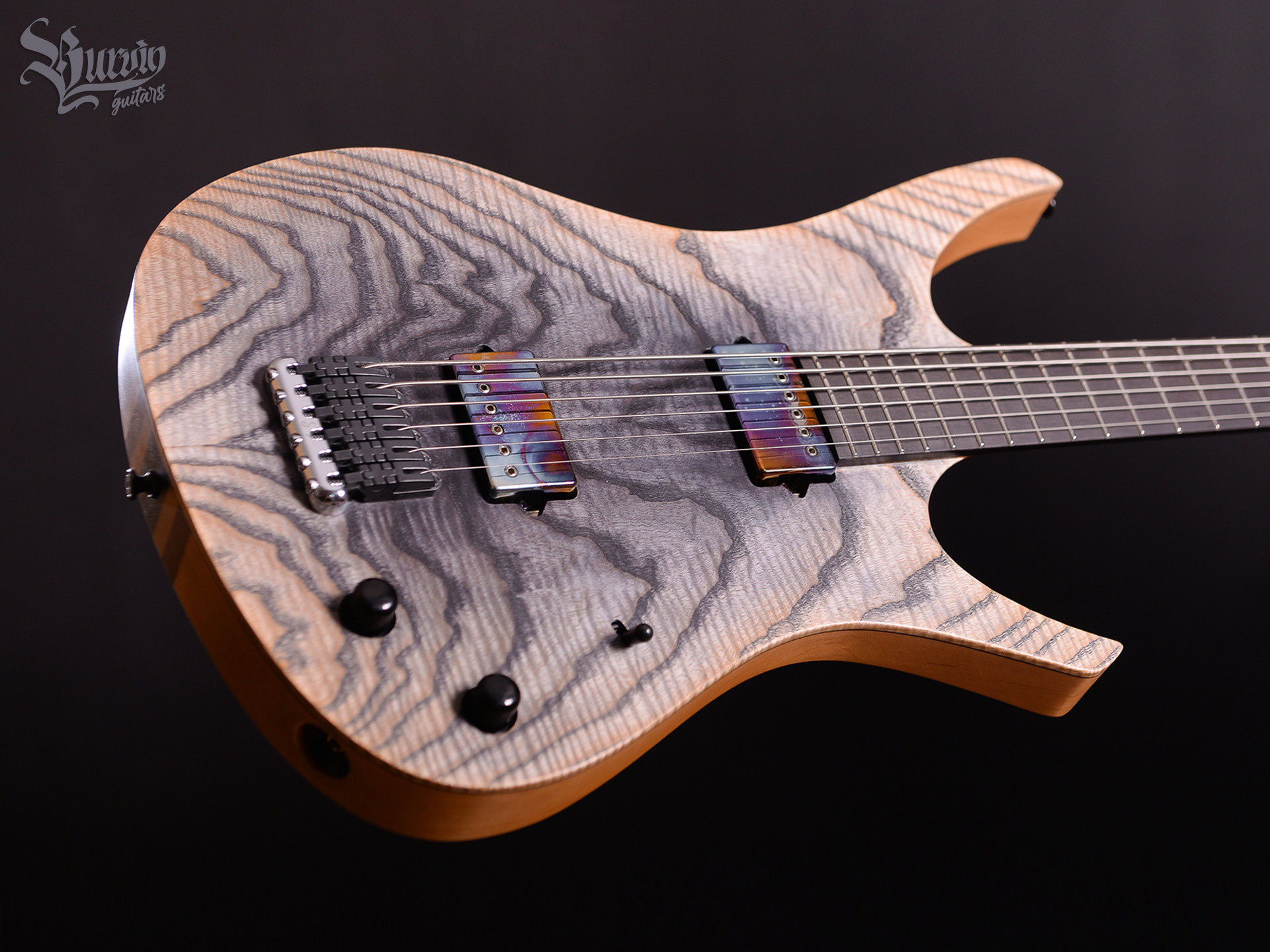 013 Three Axes. Master of making guitars and basses to order