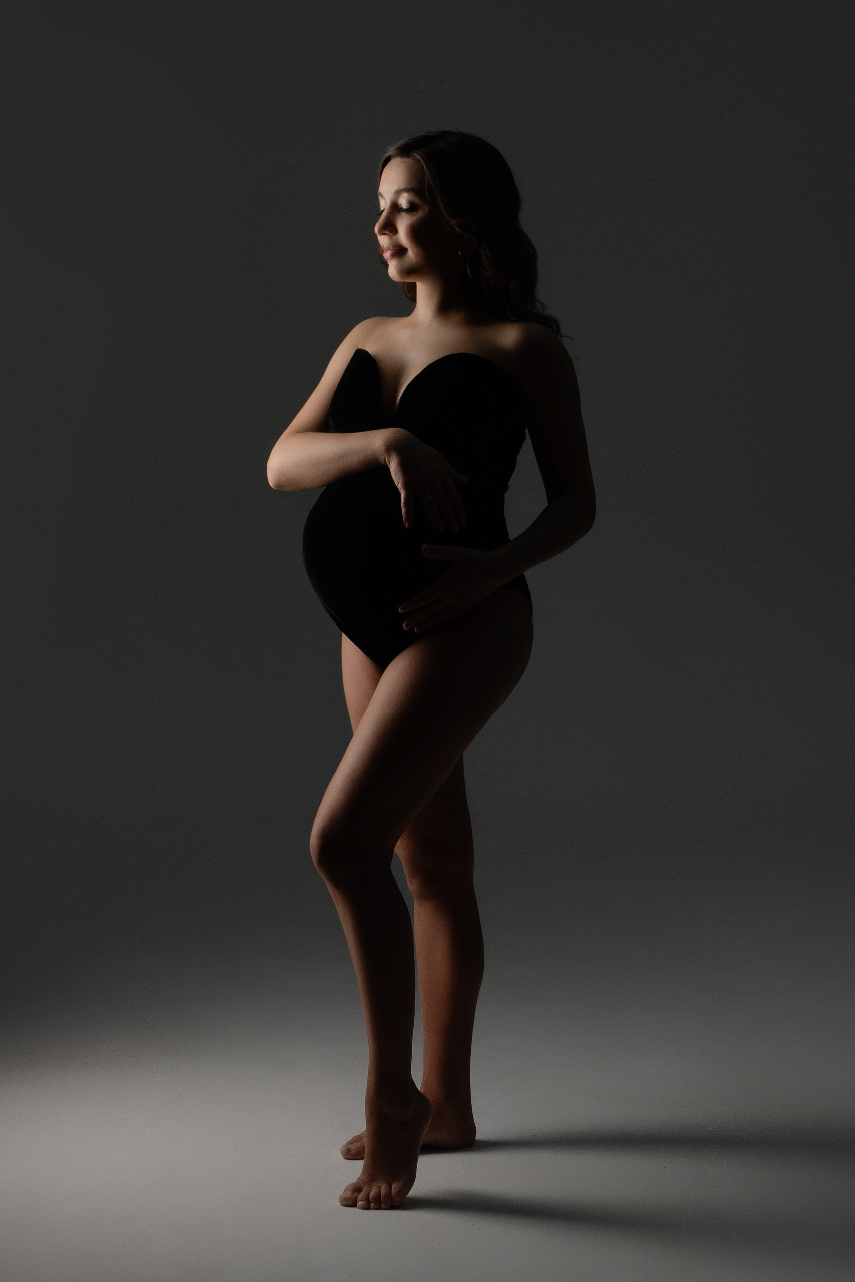 Беременная девушка в боди