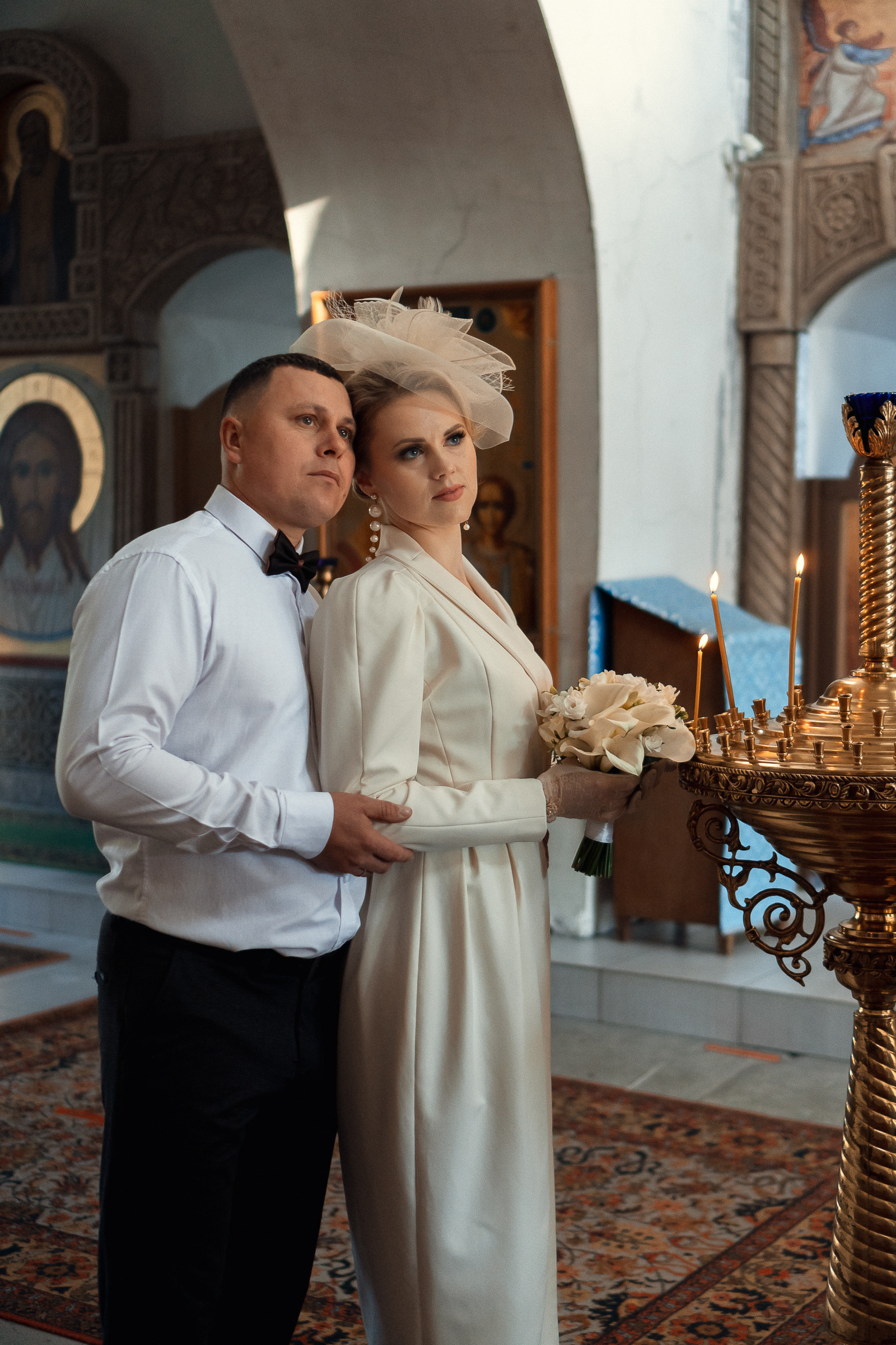 Портрет молодоженов на венчании